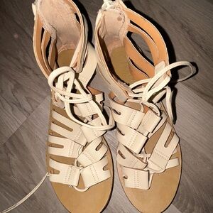 Cream Gladiator Sandals with Strappy Design and Zipper Closure